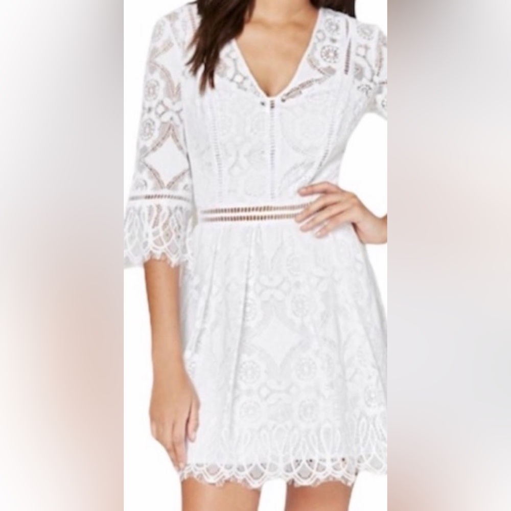 NWT Bebe White Lace illusion dress. Size 4